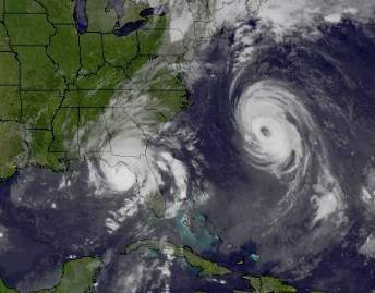 Abb. 1: Hurrikan Idalia trifft im "Pandhandle" von Florida auf Land. Auf dem Atlantik erkennt man zudem eindrücklich den Hurrikan Franklin.; Quelle: SSEC, University of Wisconsin