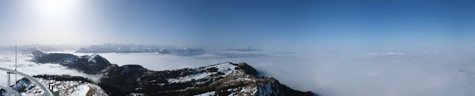Fig. 1: View from the Rigi to the high fog, above it sun and some Sahara dust; Source: Roundshot